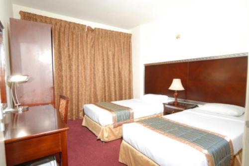 Photo of Bedroom in Al Muraqqabat
