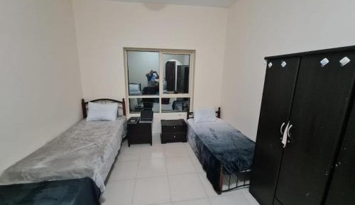 Single Bed in Male Dormitory Room with Shared Bathroom
