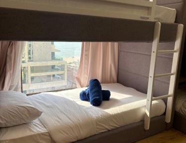 Bed in 6-Bed Female Dormitory Room