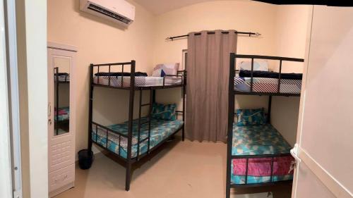 Single Bed in Dormitory Room